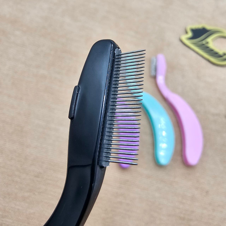 شانه مژه و ابرو کله فلزی تاشو